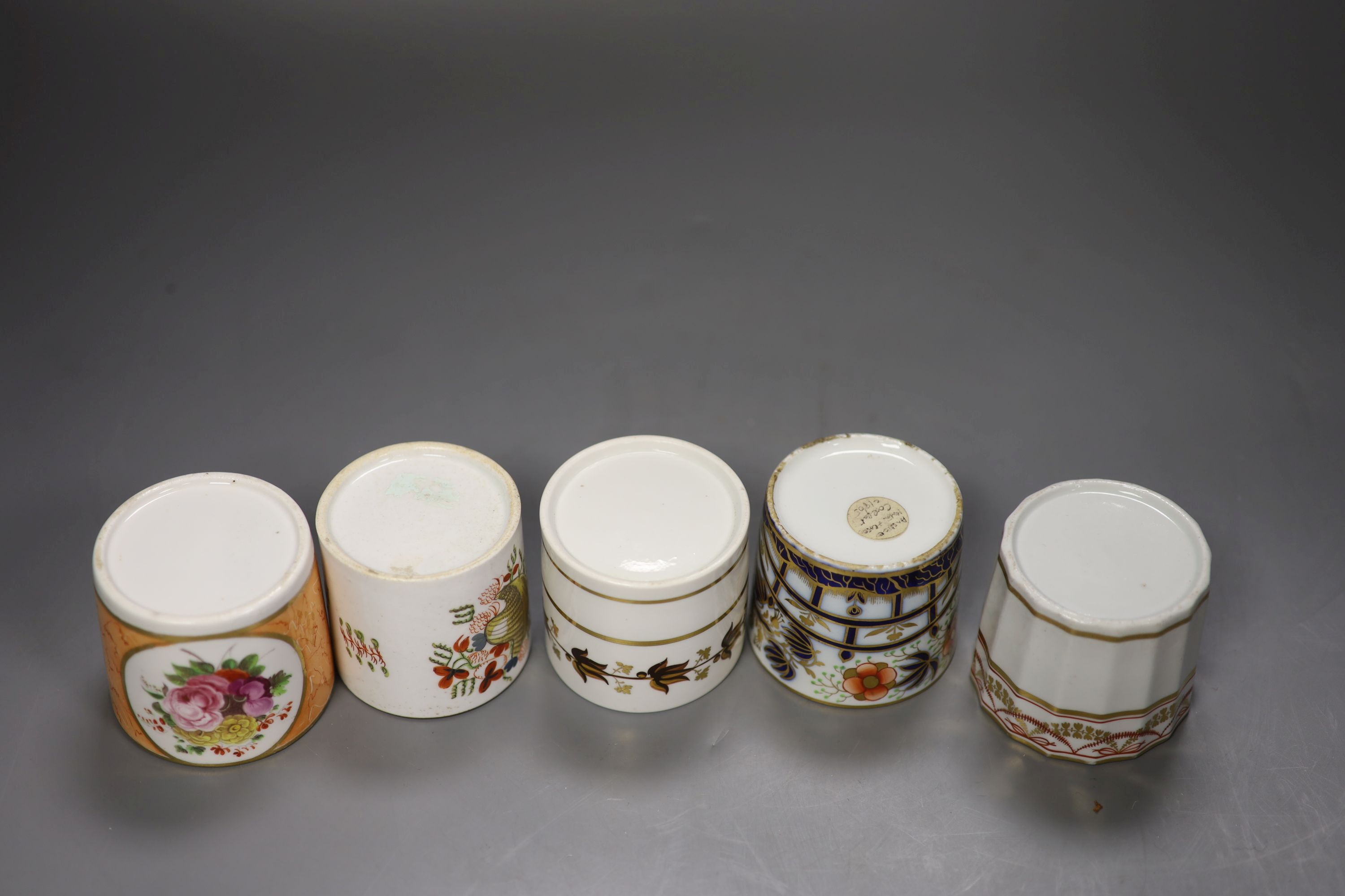 Five English coffee cans,